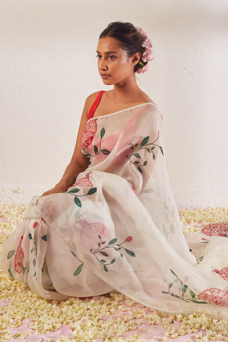 Off White Organza Silk Saree with Printed & Hand Work and Stitched Red Blouse