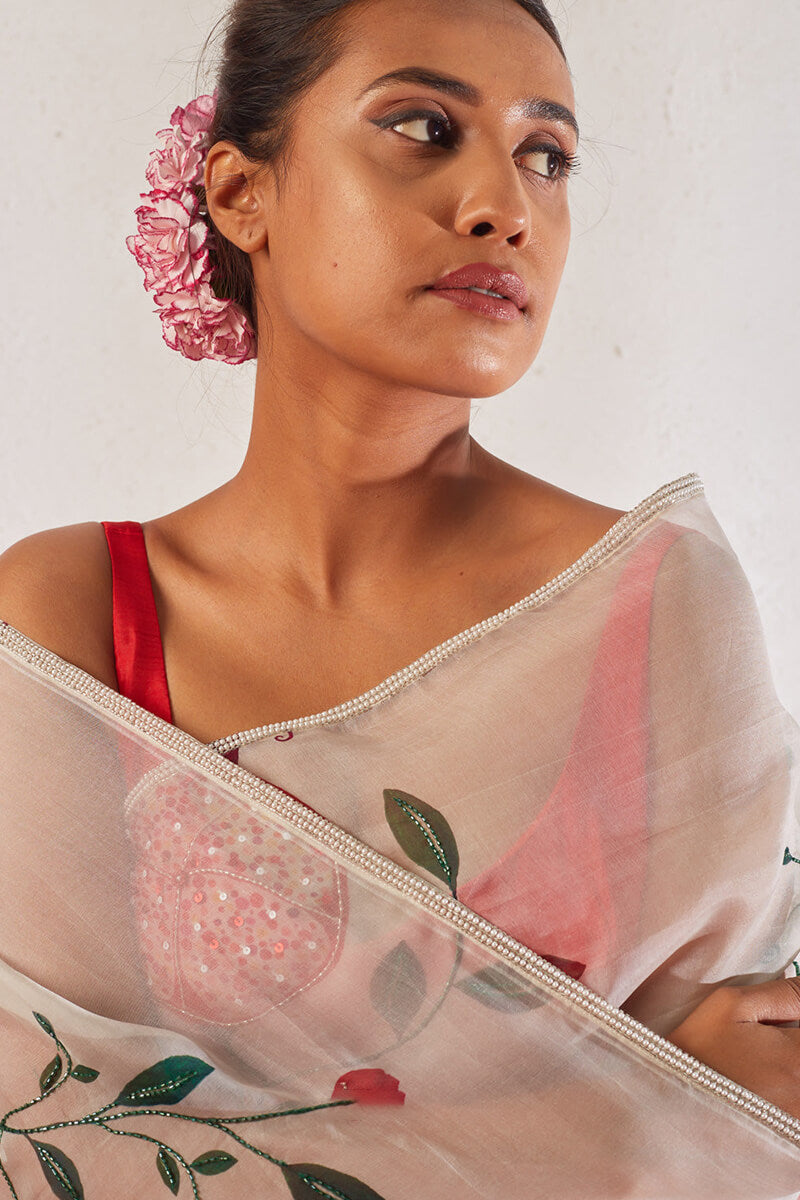 Off White Organza Silk Saree with Printed & Hand Work and Stitched Red Blouse