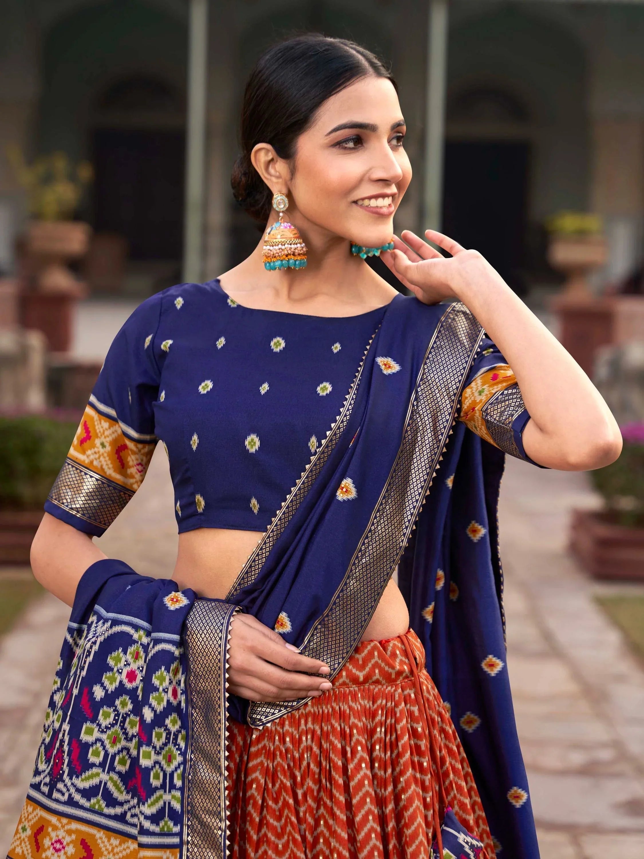Orange Patola Printed Silk Lehenga – Blue Choli & Dupatta